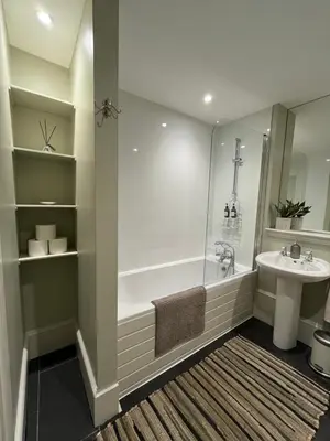 a bathroom with a shower and a sink at Acorn House Callander in Callander