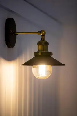 aendant light hanging from a ceiling in a room at The Mar Huts - The Lomond Hut in Drymen