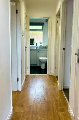a bathroom with a toilet and a sink at Rum in Oban