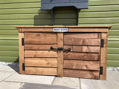 a wooden box with a sign that reads touristfacts at The Lodge at Blackhill Farm in Carluke