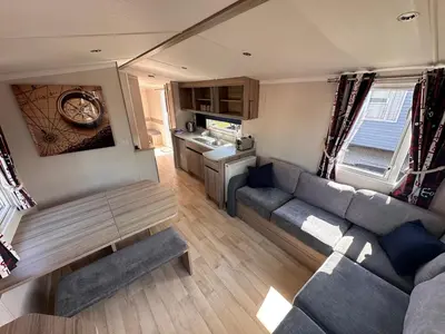 an aerial view of a living room and kitchen in a caravan at 3-Bedroom Swift Caravan - Located in Uddingston, Glasgow at Maryville Caravan Site in Glasgow