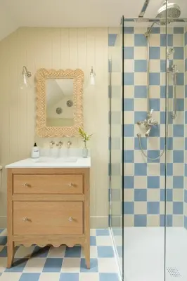 a bathroom with a sink and a mirror and a shower at Penicuik Estate in Penicuik