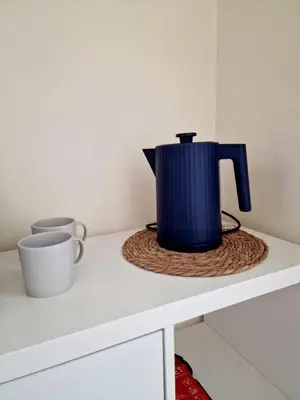 a blue pot sitting on top of a counter at Yuriko in Saint Davids