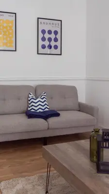a living room with a couch and a coffee table at 3 BDR House At Caledonia Luxe Stays Short Lets & Serviced Accommodation Tillicoultry in Tillicoultry