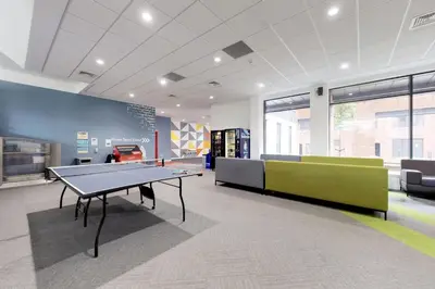 a room with a ping pong table in it at Abodus St James Glasgow in Glasgow