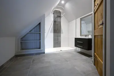 a bathroom with a shower and a sink at Falcon Steading in Buchanty
