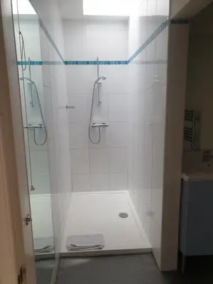 a bathroom with a shower and a sink at Rose Street 2 bedroom in Edinburgh
