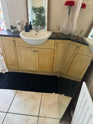 a bathroom with a sink and a mirror at Haymaeket Centro Edinburgh in Edinburgh