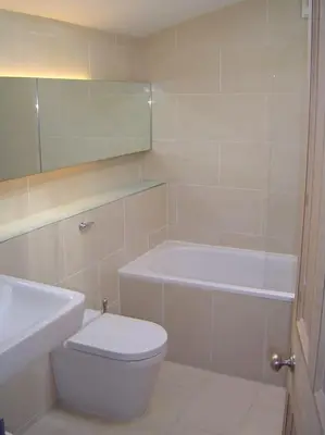 a bathroom with a toilet and a sink and a tub at Coolranny Schoolhouse in Torr