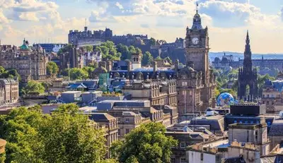 a view of a city with a clock tower at Bright Edinburgh Flat - City Center EB7 in Edinburgh