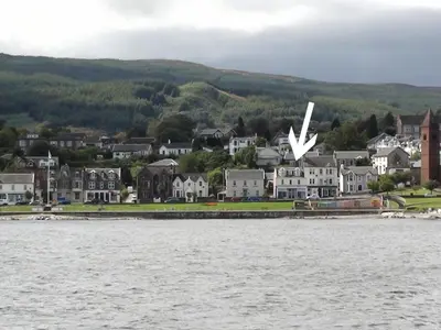 a town on the shore of a body of water at Apartment Sea View in Hunters Quay