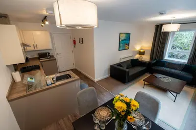 an aerial view of a living room and a kitchen at Aberlour Apartment in Oban