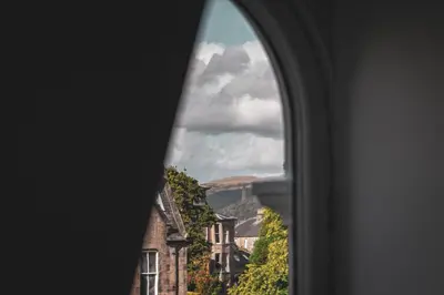 anorthole window of a building with a view at Spacious 4 Bedroom Flat in Stirling in Stirling
