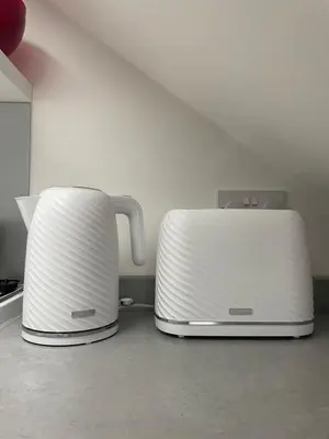 two toasters sitting next to each other on a counter at Foundry Street Apartment 2 - Dunfermline city centre in Dunfermline