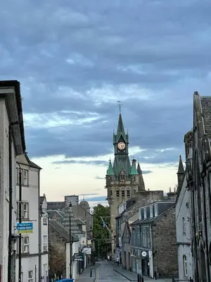 a building with a clock tower in a city at Foundry Street Apartment 2 - Dunfermline city centre in Dunfermline