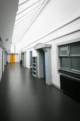 an empty hallway of a building with a room with a unintention at Cunninghame 4 in Beith