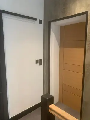 a door leading into a room with a closet at House Aurora in Edinburgh