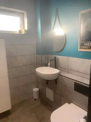 a bathroom with a sink and a toilet at House Aurora in Edinburgh