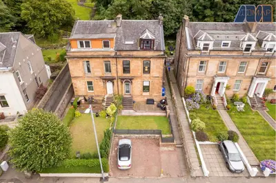 an aerial view of a large house with a yard at Albert Road in Gourock