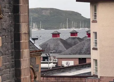 a view of a harbor with boats in the water at Heart of Oban in Oban
