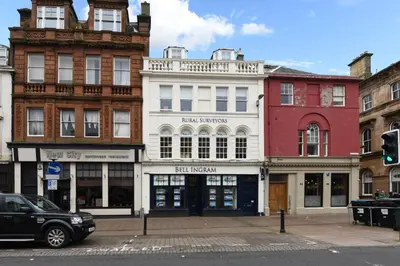 a group of buildings on a city street at Ayrbados - 4 bed townhouse in Ayr in Ayr