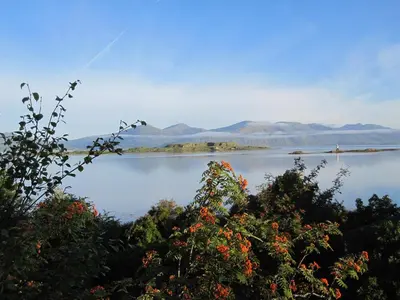 a view of a lake with mountains in the background at Tirlaggan House in Oban