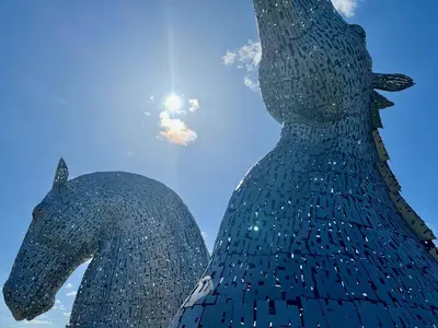 a statue of a bear with the sky in the background at Knightsridge House in Livingston