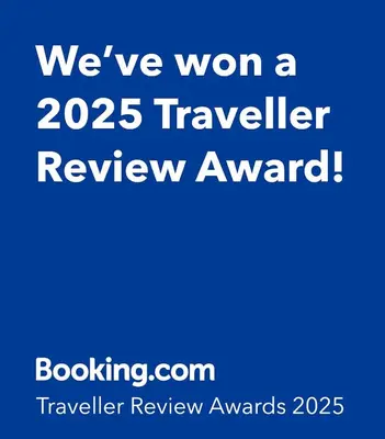 a blue sign that says weve won a traveler review award at Knightsridge House in Livingston