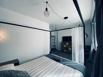 a bedroom with a bed in a room at Shore Cottage in Girvan