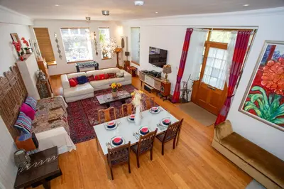 an overhead view of a living room with a table and chairs at The Banking Hall in Polmont