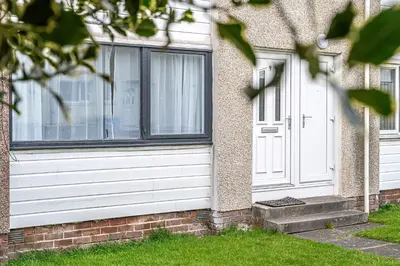a house with a white door and windows at Pure Home Rosyth Dockyard by TBA in Rosyth