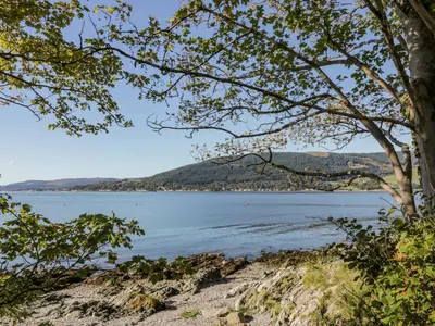 a view from the shore of a body of water at 11A Mansion View in Helensburgh