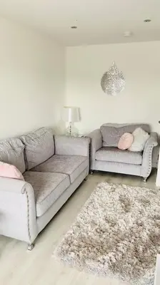 a living room with a couch and a rug at Entire 4 bed perfect family home in Glasgow in Nitshill