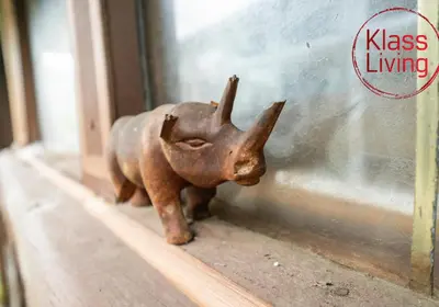 a small toy dog sitting on a window sill at Fraser House by Klass Living Rutherglen in Glasgow