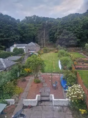 an aerial view of a garden with a playground at Fairview Millport in Millport