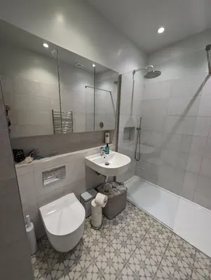 a bathroom with a toilet and a sink and a tub at Beautiful double room B&B great location homeshare Edinburgh in Edinburgh