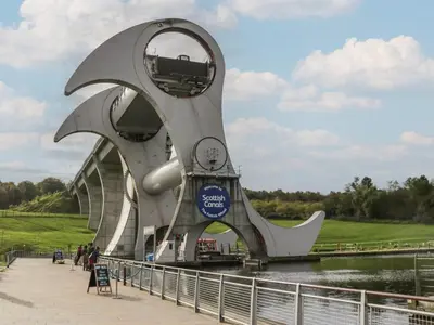 a large monument in a park next to a river at Elm in Denny