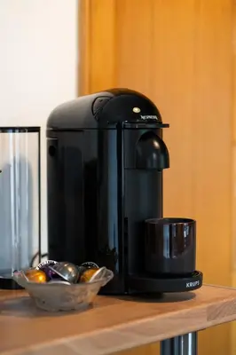 a coffee maker sitting on top of a counter at 24 Kingsford Court in Newton Mearns