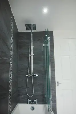 a shower in a bathroom with a glass shower backdoor at A stunning And Slick Escape in Stonehouse