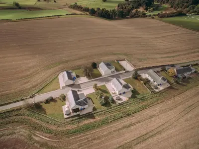 an aerial view of a house in a field at Ninetrees - Uk47883 in Keilour