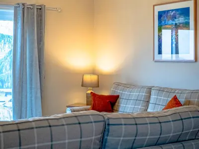 a living room with a couch and a window at Ninetrees - Uk47883 in Keilour