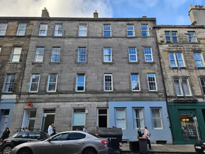 a building with a car parked in front of it at No15 Castle View in Edinburgh