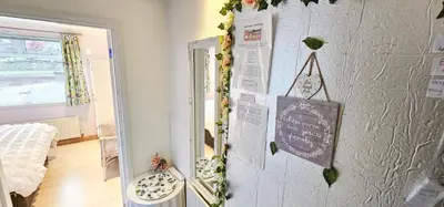 a room with a chalk board on a wall at Boghead Cottage The West Wing in Bathgate