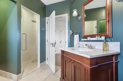 a bathroom with a sink and a mirror at Ugadale Cottages in Machrihanish