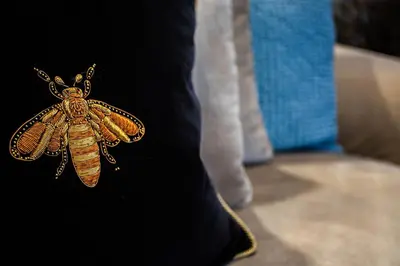 a drawing of a bee on a black shirt at Arran Shores Luxury Shorefront Penthouse Suite 11 in Lamlash