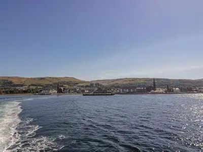 a view of a body of water from a boat at 8 George Street in Millport