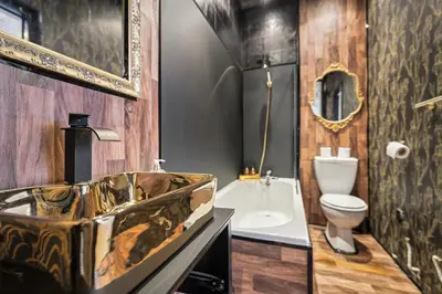 a bathroom with a sink and a toilet at Grand 2 Bed West End Residence in Glasgow