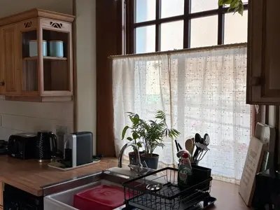 a kitchen with a sink and a window at 11 George Street Doune in Stirling