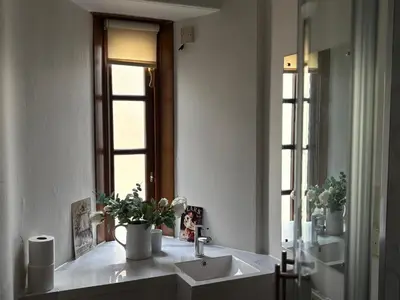 a bathroom with a sink and a mirror at 11 George Street Doune in Stirling