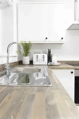 a kitchen counter with a sink in a kitchen at Montgomery Avenue in Paisley